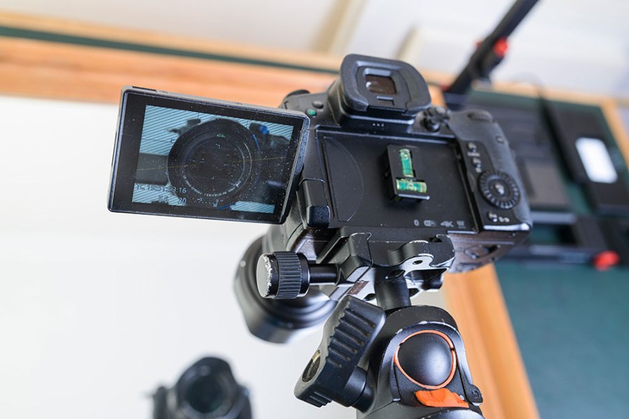 Digitising and photographing film using a DSLR or mirrorless camera.